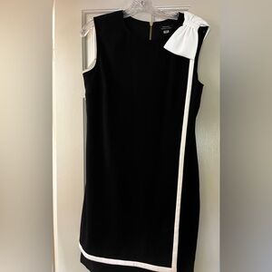 Elegant cocktail dress, reminiscent of Audrey Hepburn.